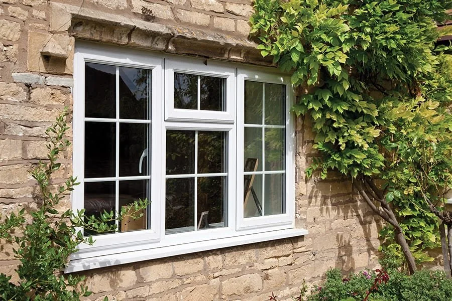 White uPVC casement windows with decorative leaded glazing
